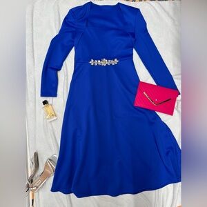 Elegant Blue Dress with Embellished Waist
